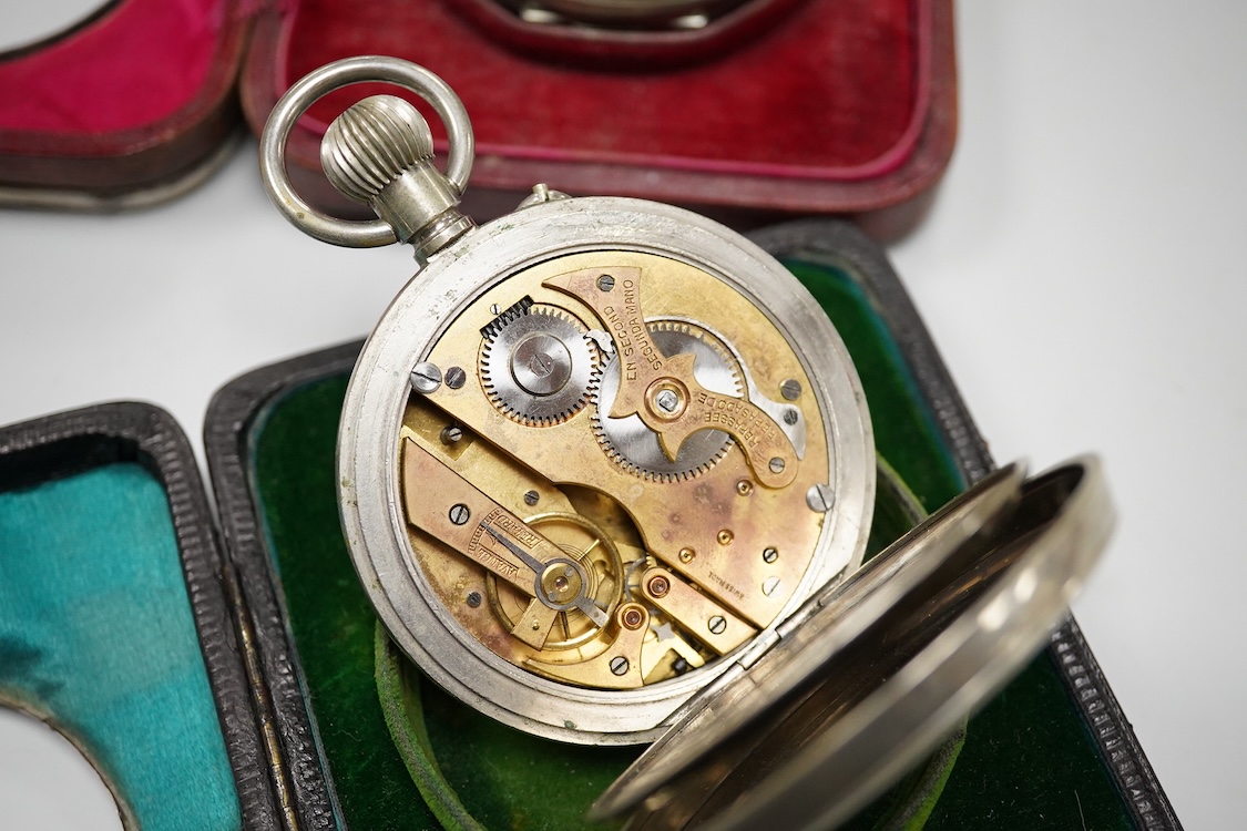 Two Edwardian silver mounted leather travelling watch cases, Chester 1905 and Birmingham, 1907, both containing a chrome cased keyless pocket watch.
